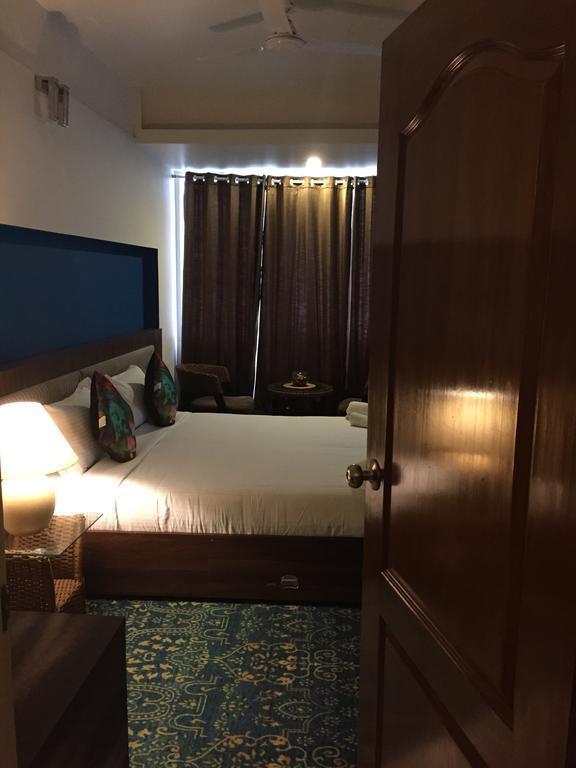 Luxtay Suites Μπανγκαλόρ Δωμάτιο φωτογραφία