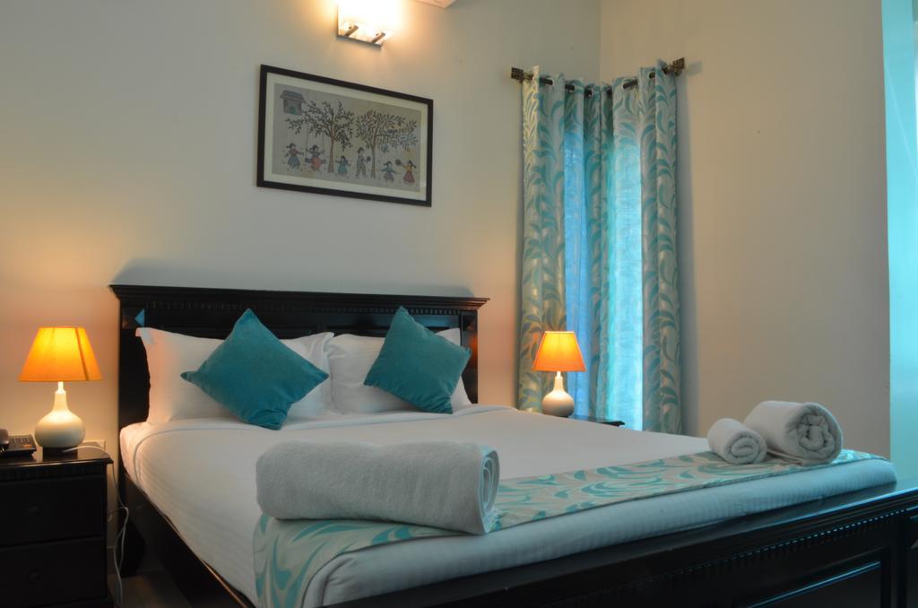 Luxtay Suites Μπανγκαλόρ Δωμάτιο φωτογραφία